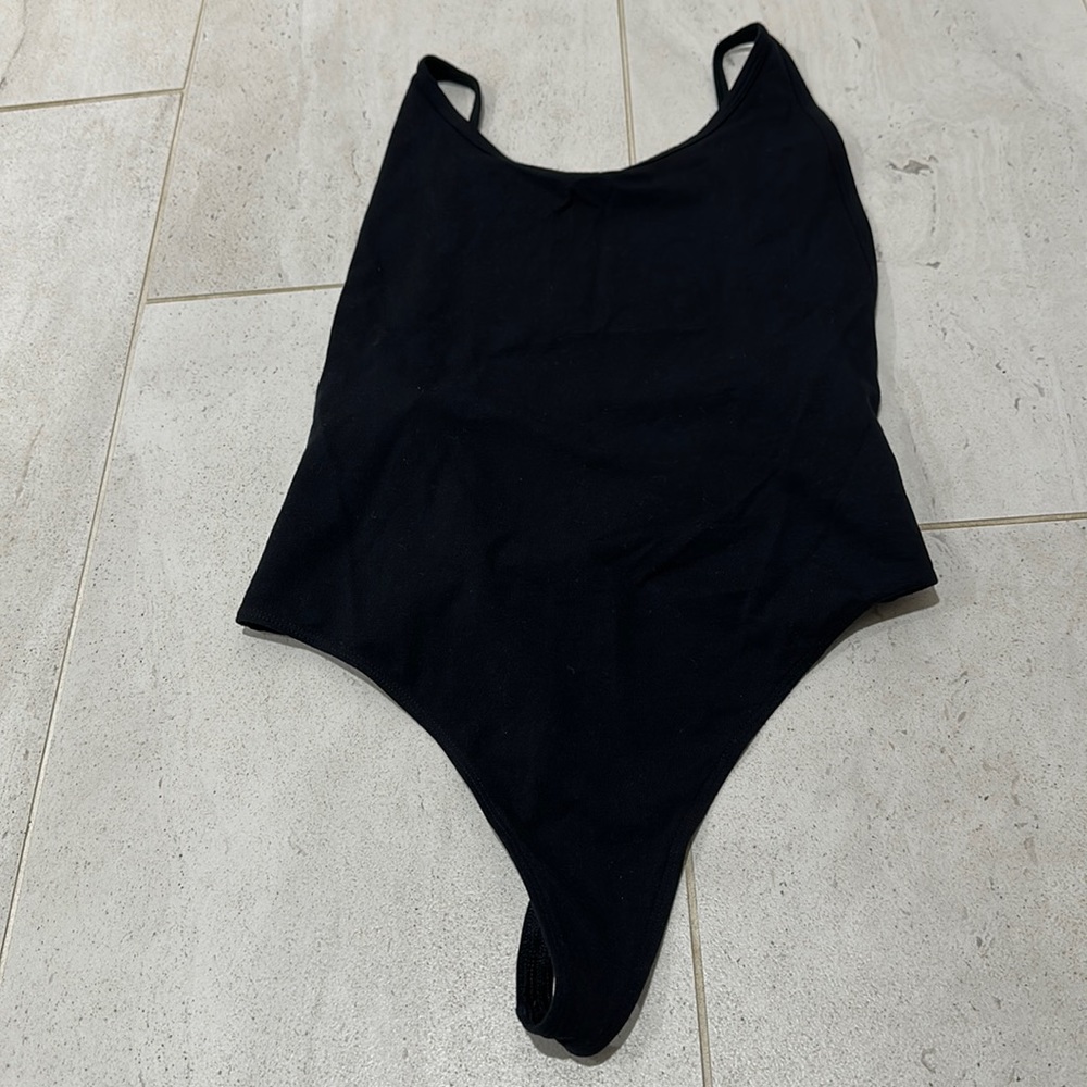 TNA black bodysuit - thin straps/deep back, thong style. Medium, worn once